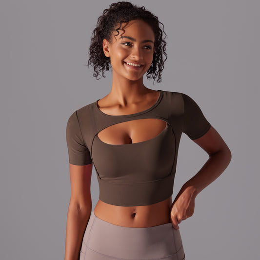 Black mesh double layer cutout sports bra by Alabaster, featuring breathable fabric and body-hugging fit.