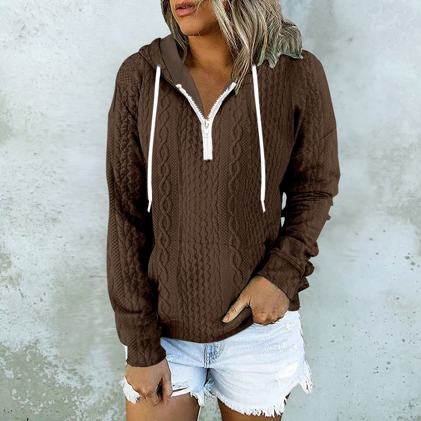 White cable knit zip-up hoodie with drawstring hood for women by Alabaster