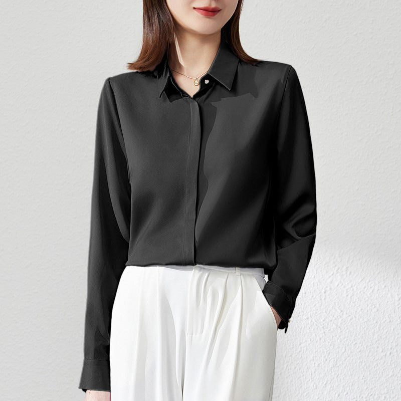 White satin long sleeve blouse with button front by Alabaster, suitable for office wear
