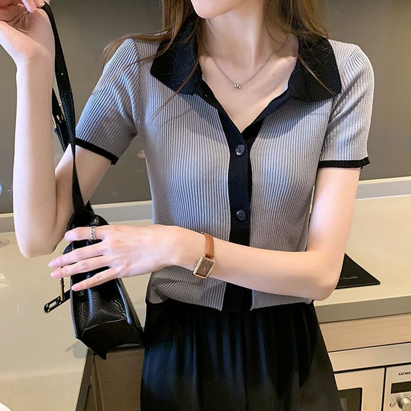 Black ice silk knit top with contrast collar, elegant design by Alabaster, available in sizes S, M, L.